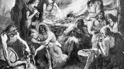 Grupo de hombres y mujeres primitivos en una cueva