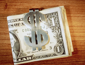 ¿Por qué el símbolo del dólar es una S con dos barras verticales?