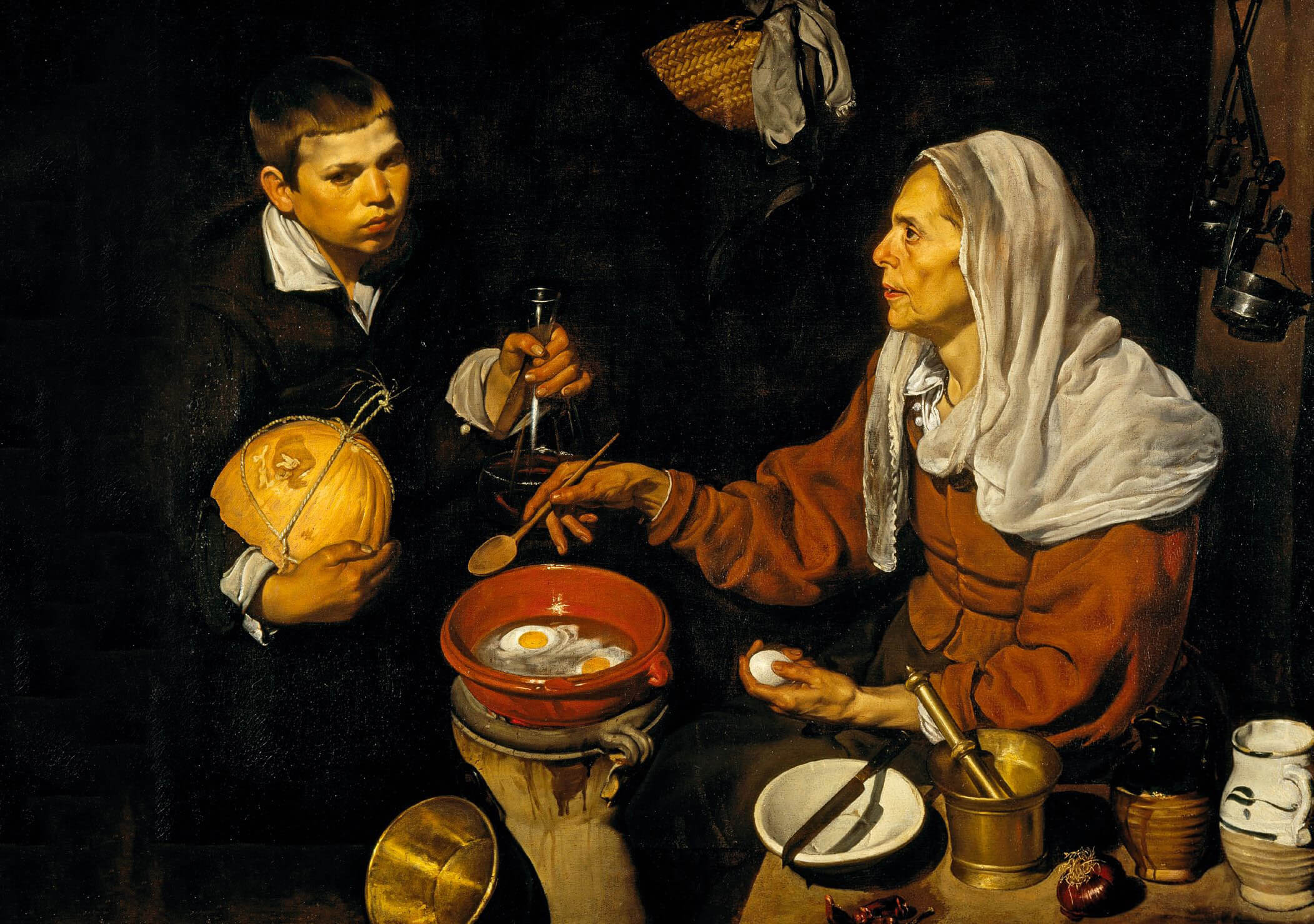 Vieja friendo huevos