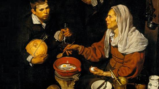 Vieja friendo huevos