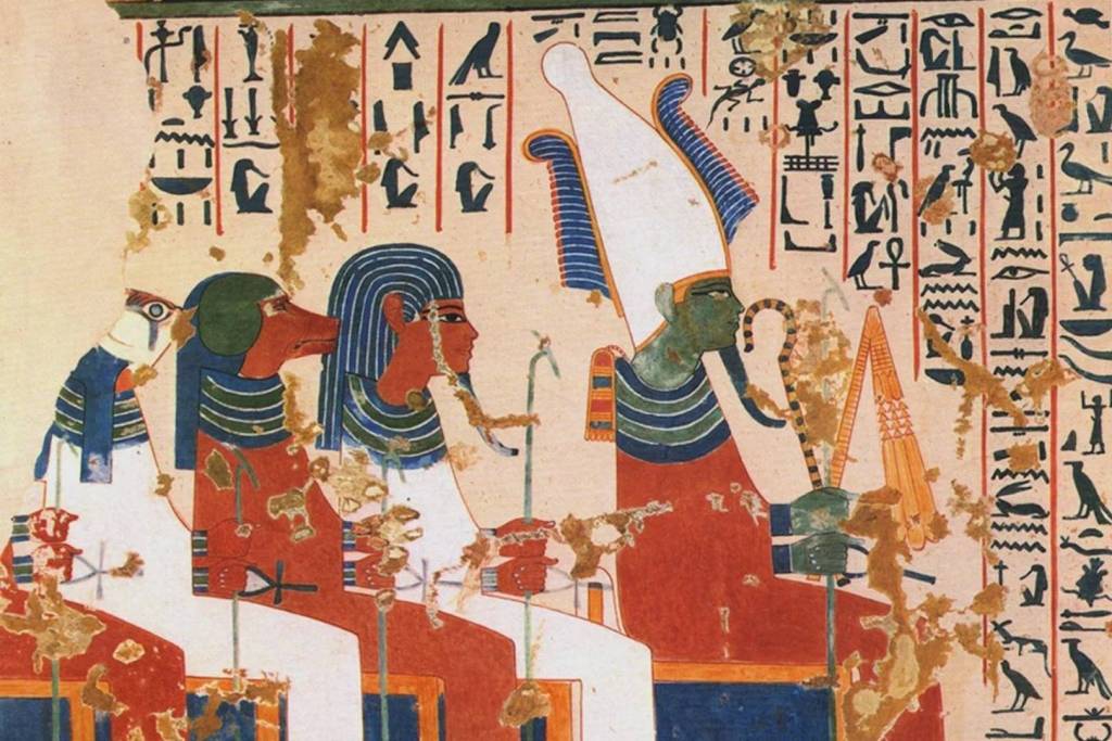 La figura de Osiris acompañada por los cuatro protectores de Horus