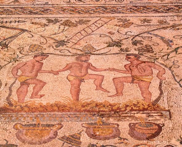 Mosaico de pisadores de uva en Mérida